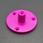 3D printed lathe chuck holder mounted on workshop wall