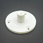 3D printed lathe chuck holder mounted on workshop wall