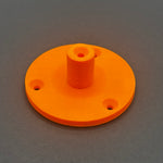 3D printed lathe chuck holder mounted on workshop wall