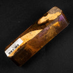 Hybrid resin burl call blank BC-0002 with rich brown and tan wood grain accented by purple and gold resin