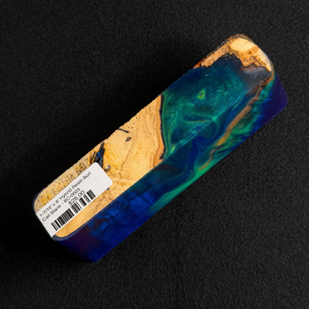 Hybrid resin burl call blank BC-0003 with tan wood grain next to vibrant swirling teal and blue resin