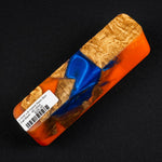 Hybrid burl call blank BC-0004 with vibrant orange resin, deep blue swirls and natural golden wood grain