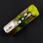Hybrid burl call blank BC-0007 featuring vibrant lime green and dark green resin surrounding natural wood inclusions