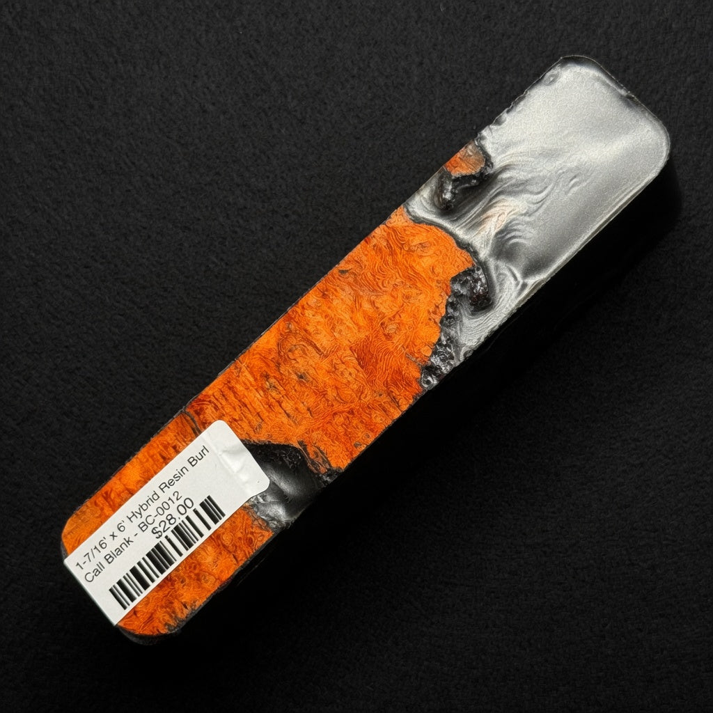 Hybrid burl call blank BC-0012 showcasing vibrant orange wood grain next to metallic silver and black resin areas