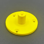 3D printed lathe chuck holder mounted on workshop wall