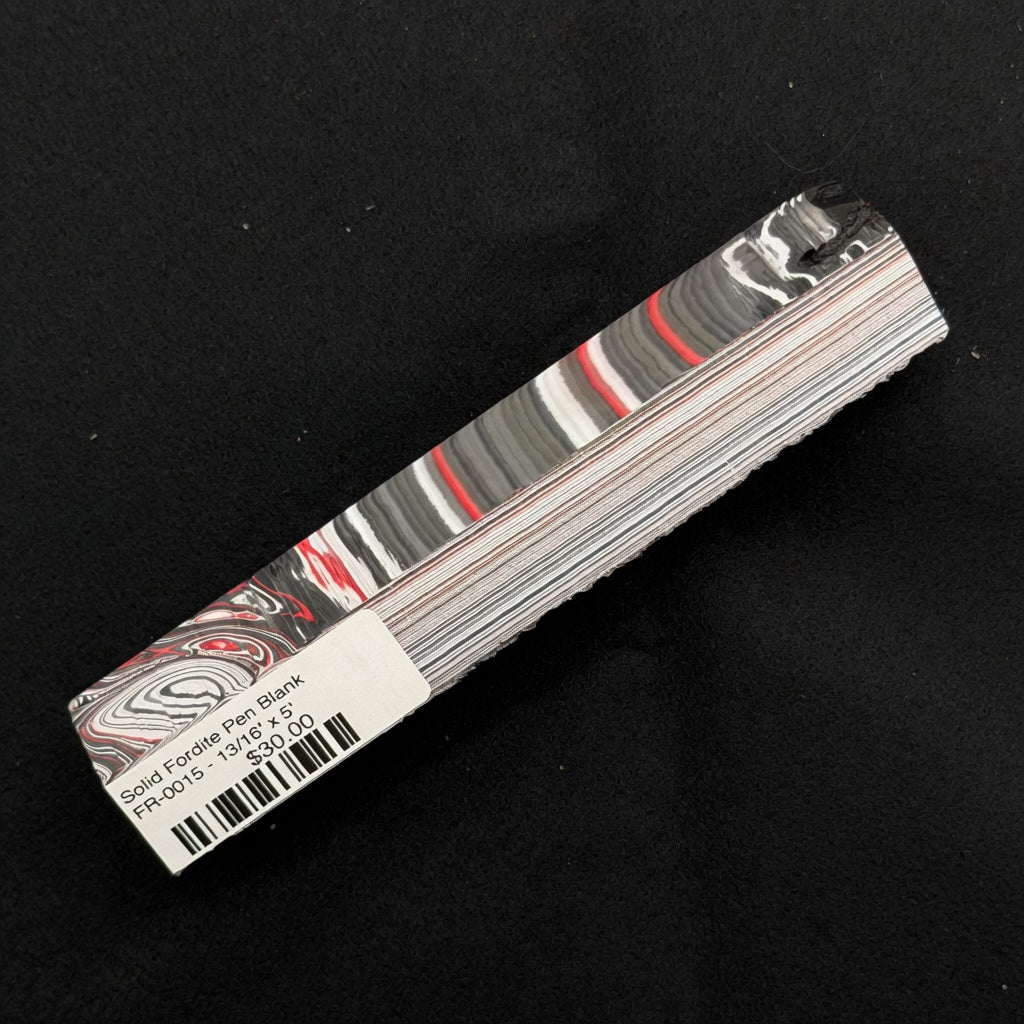 Solid Fordite pen blank FR-0015 displaying rich red, black, white and gray automotive paint layers