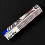 Solid Fordite pen blank FR-0025 with bold blue, red, black and silver layered paint patterns