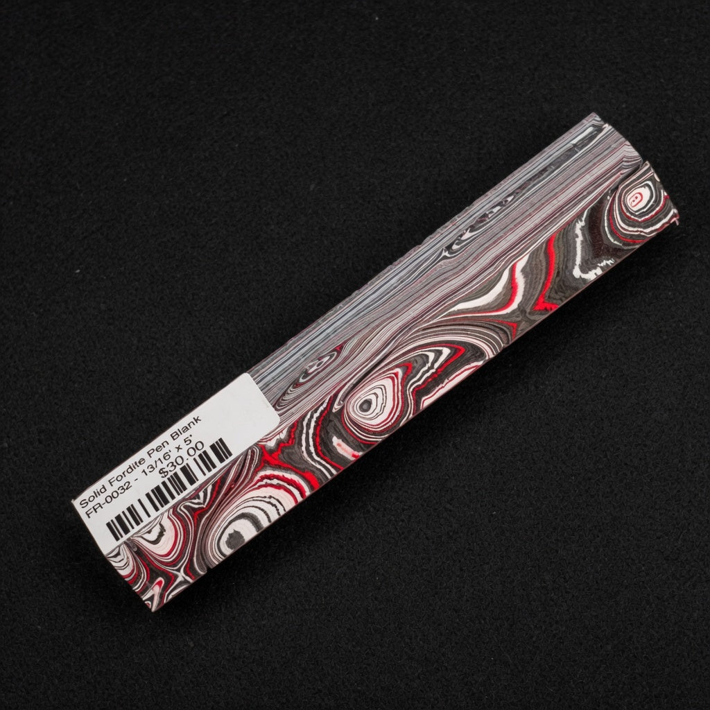 Solid Fordite pen blank FR-0032 showcasing vibrant red, white, black, and gray layered automotive paint