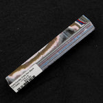 Solid Fordite pen blank FT-0002 displaying layered bands of brown, pink, blue, red and gray automotive paint