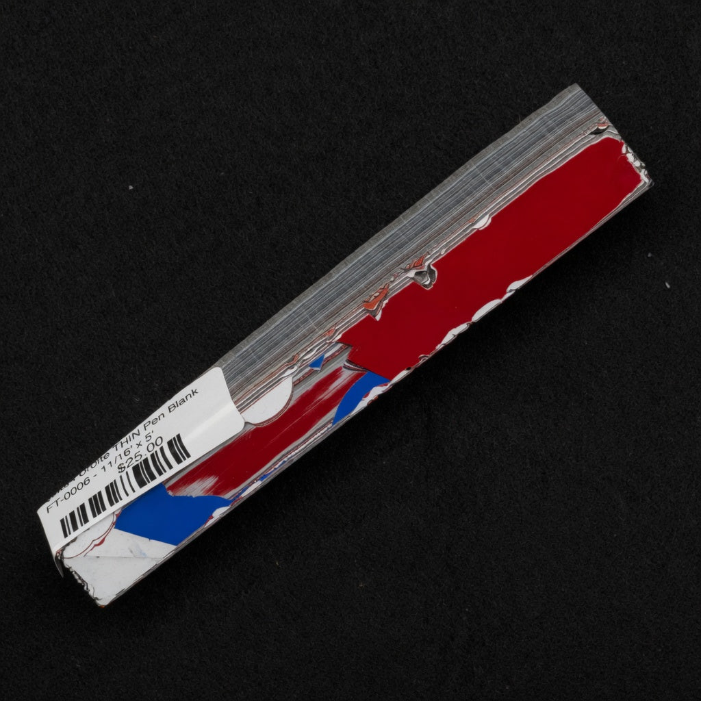Solid Fordite pen blank FT-0006 showcasing bold red and blue layers with fine gray and white horizontal stripes from decades of automotive overspray