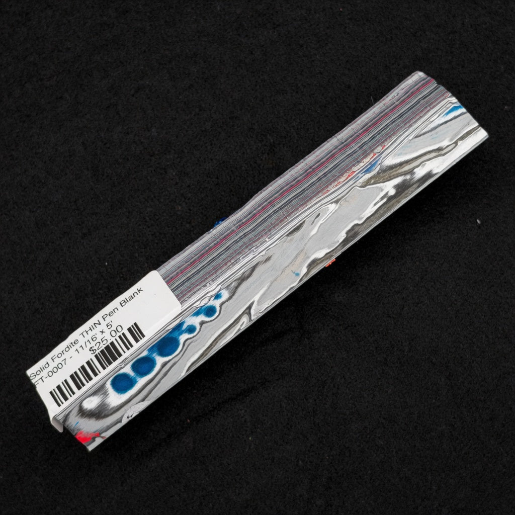 Solid Fordite Pen Blank FT-0007 with layered red and blue lines across a marbled silver and gray surface