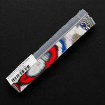 Solid Fordite pen blank FT-0017 displaying bold red, blue, black and white layered paint colors
