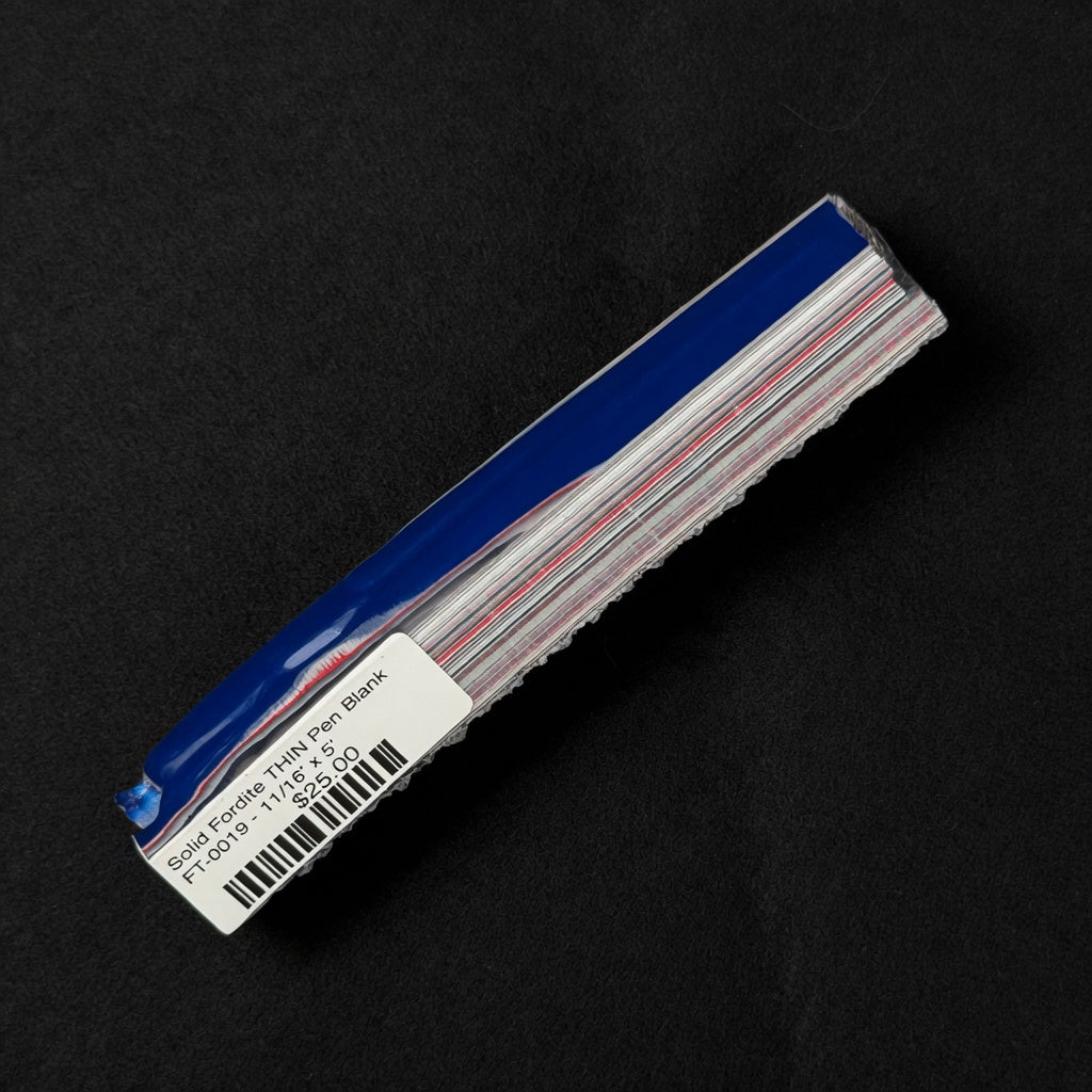 Solid Fordite pen blank FT-0019 with bold blue layers accented by thin red and white stripes