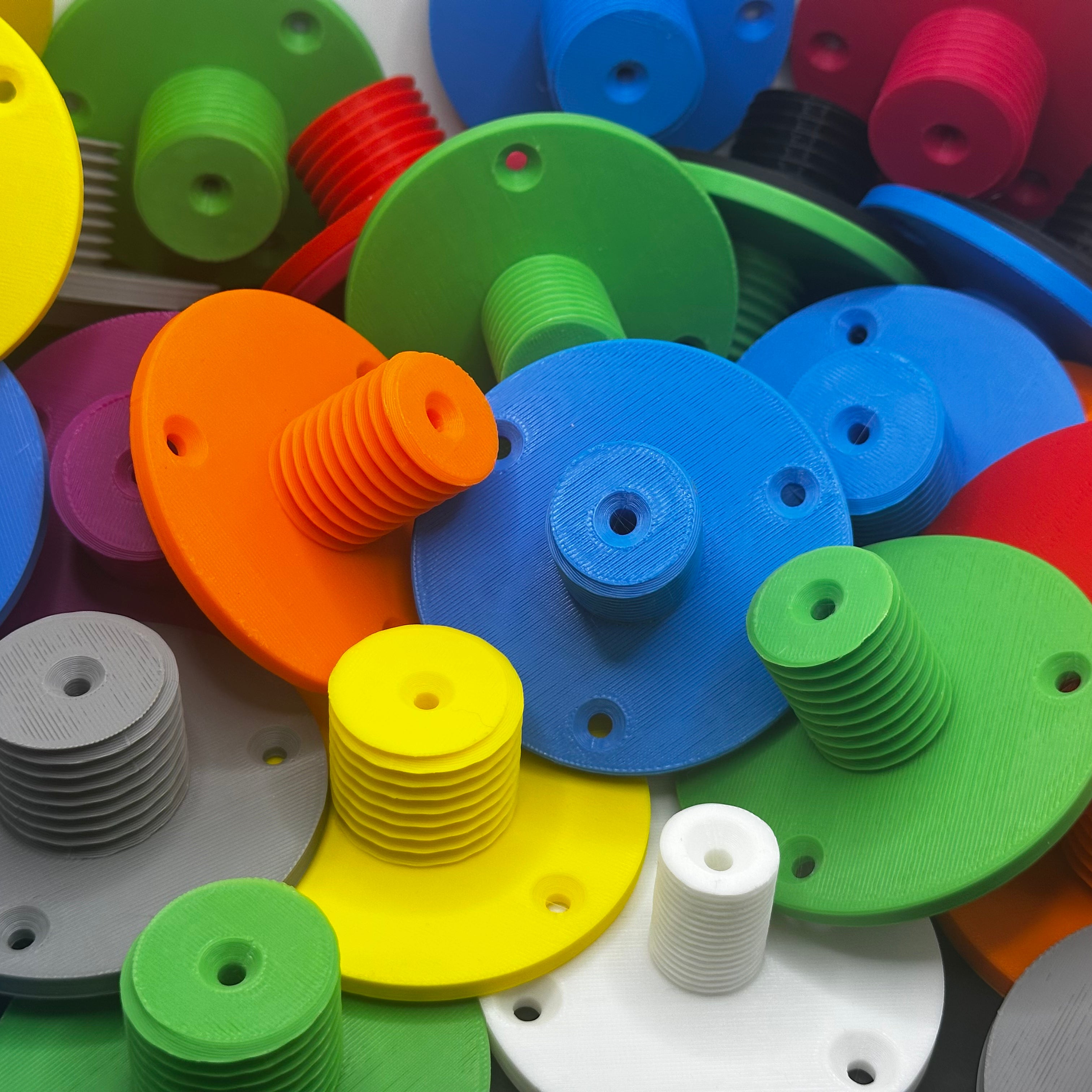 3D printed lathe chuck holder mounted on workshop wall