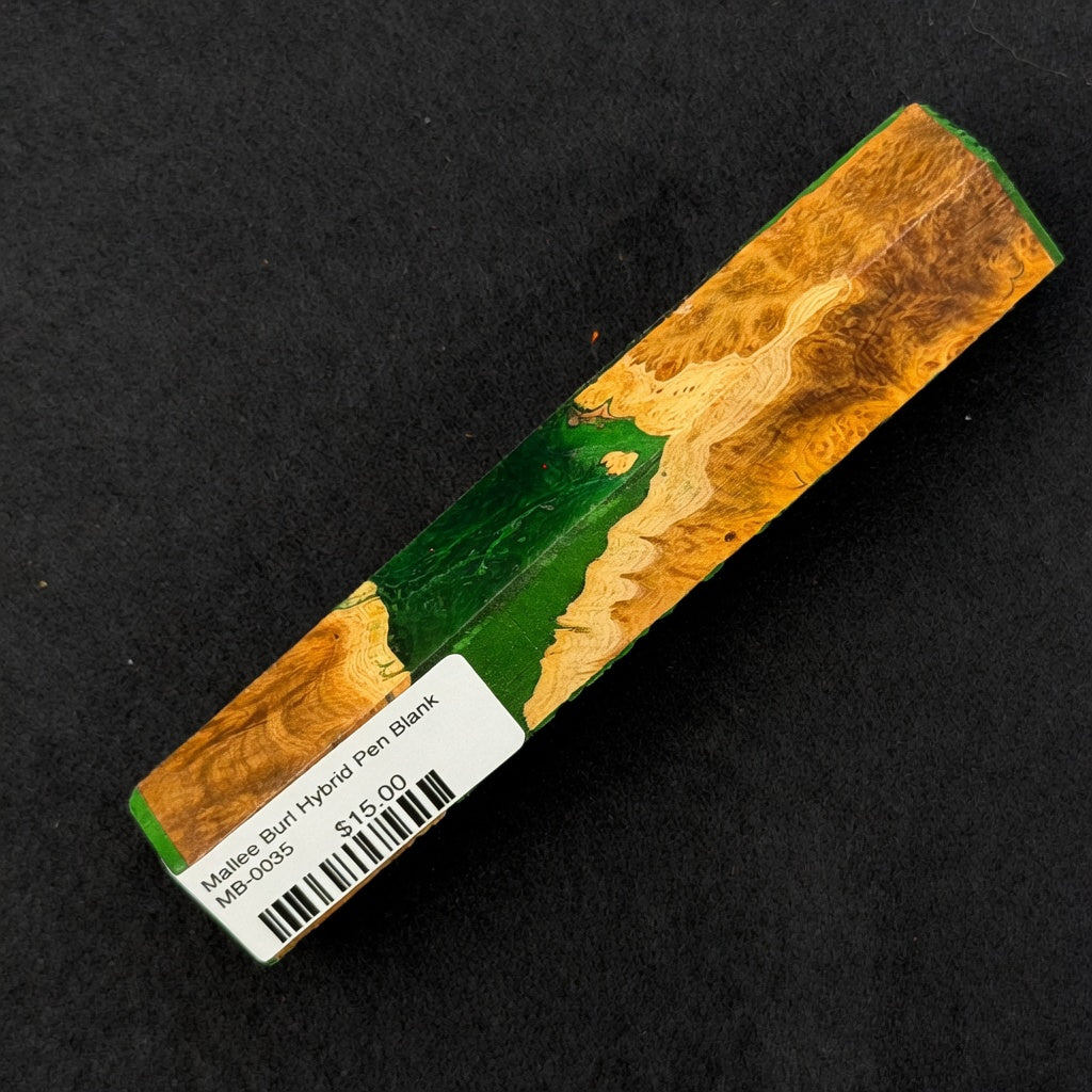 MB-0035 Mallee Burl Resin Hybrid Pen Blank displaying rich orange and brown burl wood grain next to emerald green resin