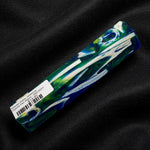 Mosaic Gator Jawbone Hybrid Pen Blank MG-0027 with bold blue and green resin swirls surrounding ivory jawbone pieces