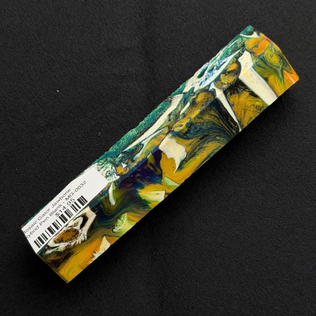 Mosaic Gator Jawbone Hybrid Pen Blank MG-0032 with swirling teal green yellow orange and blue patterns surrounding white bone pieces in clear resin